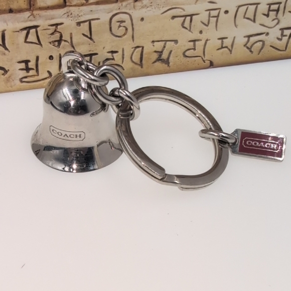 RARE Coach Metallic Bell Keyring The Parisienne's Polished Coach Bell Bag Charm - Picture 1 of 5
